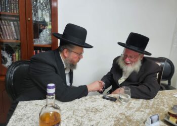 איש על הקופה